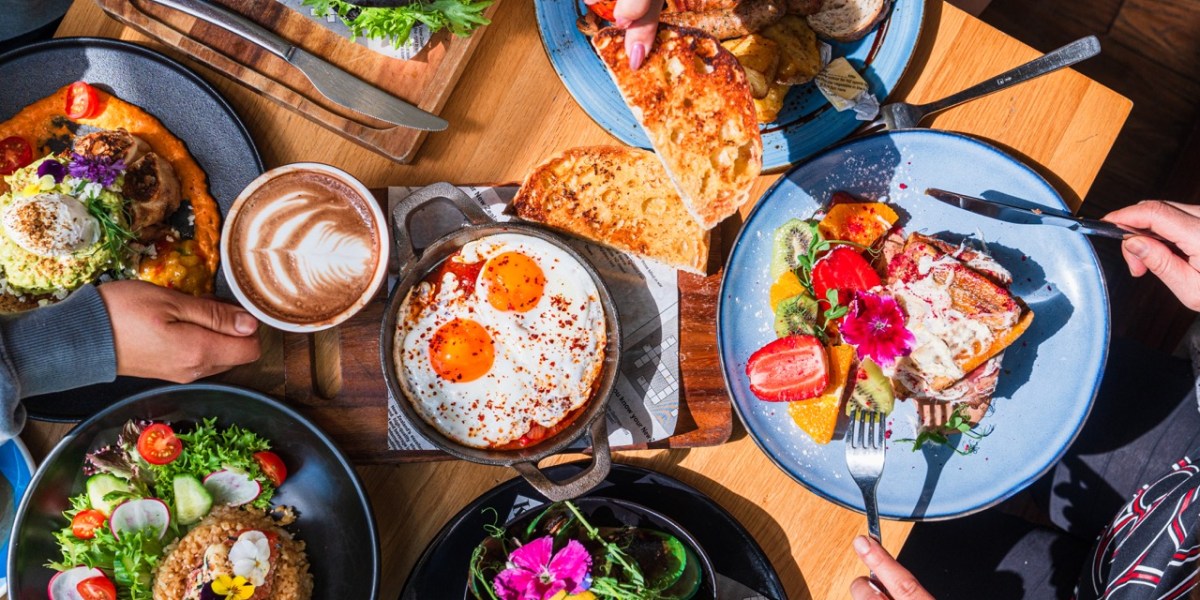 A tabletop view showing brunch food.