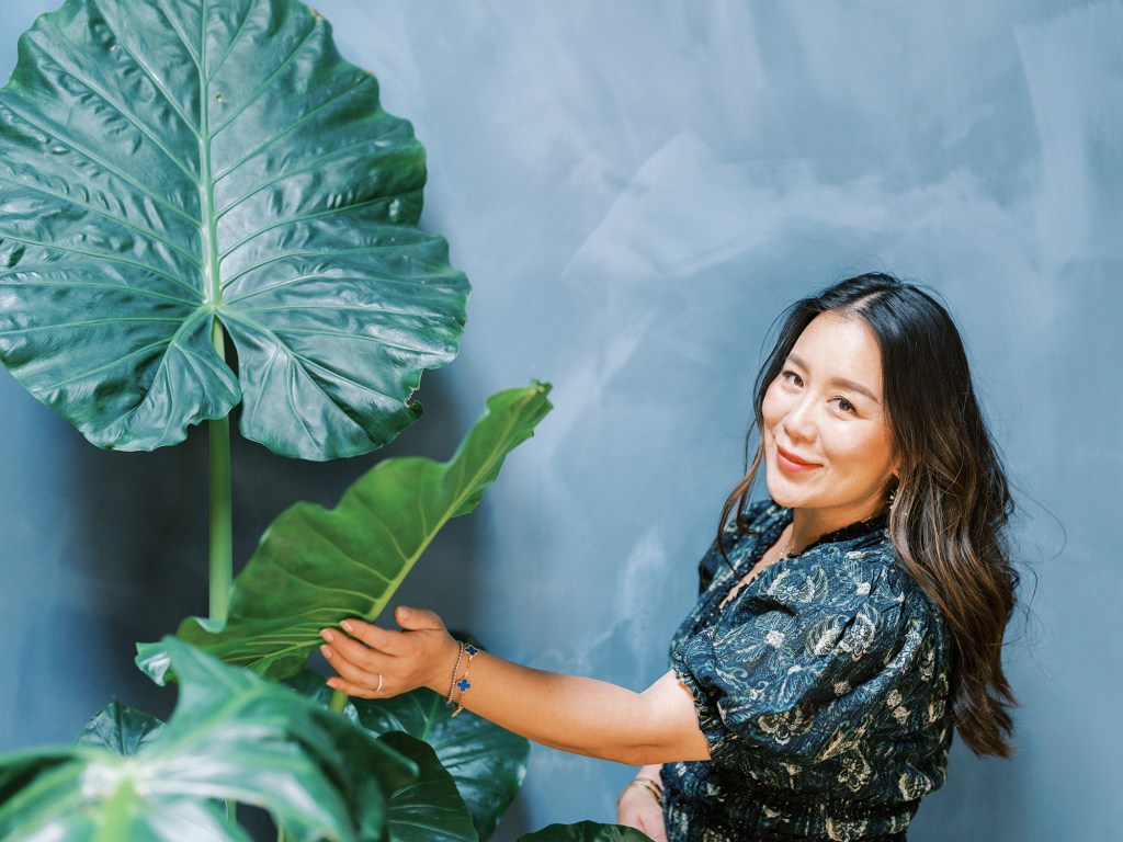 Jenny Yi with Large-Leafed Plant