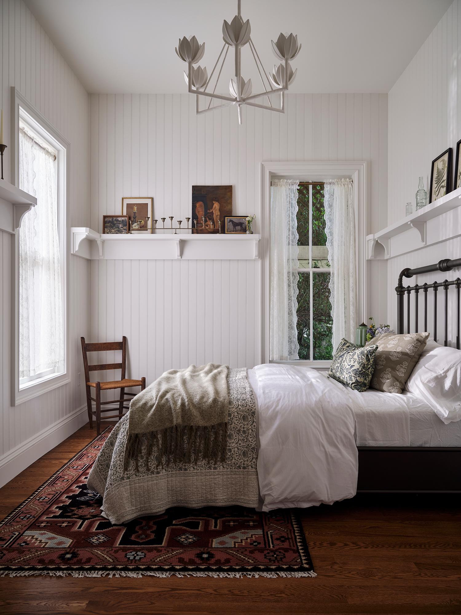 Primary Bedroom in Mendocino Italianate House by Atelier Julienne
