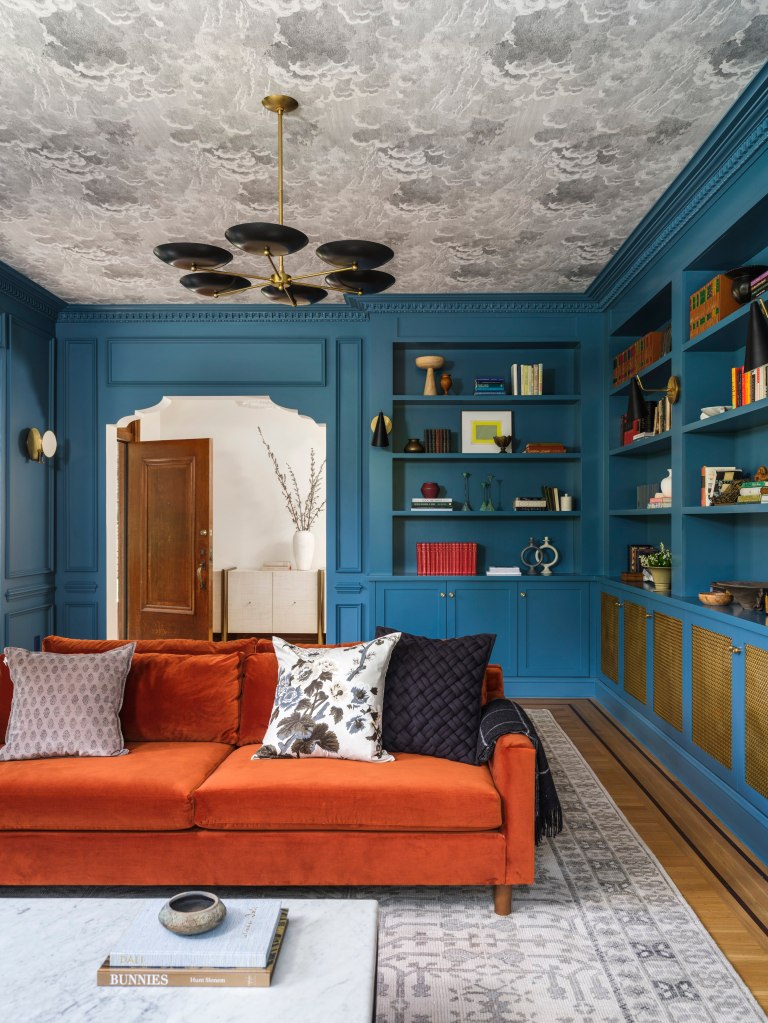 Blue room with uniquely patterned ceiling