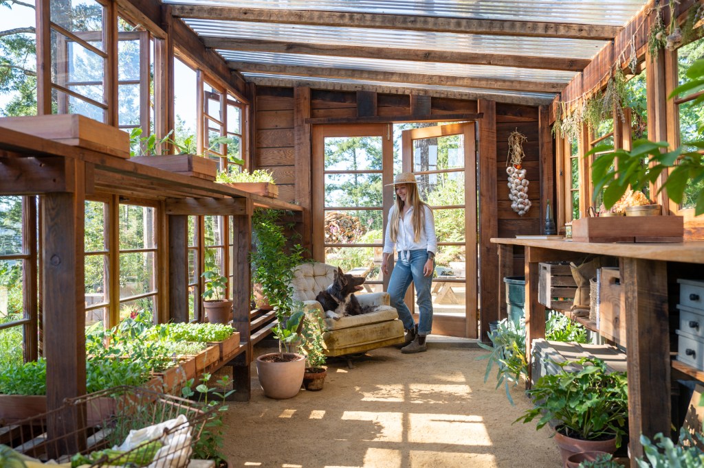Christiana Drewry in her Greenhouse
