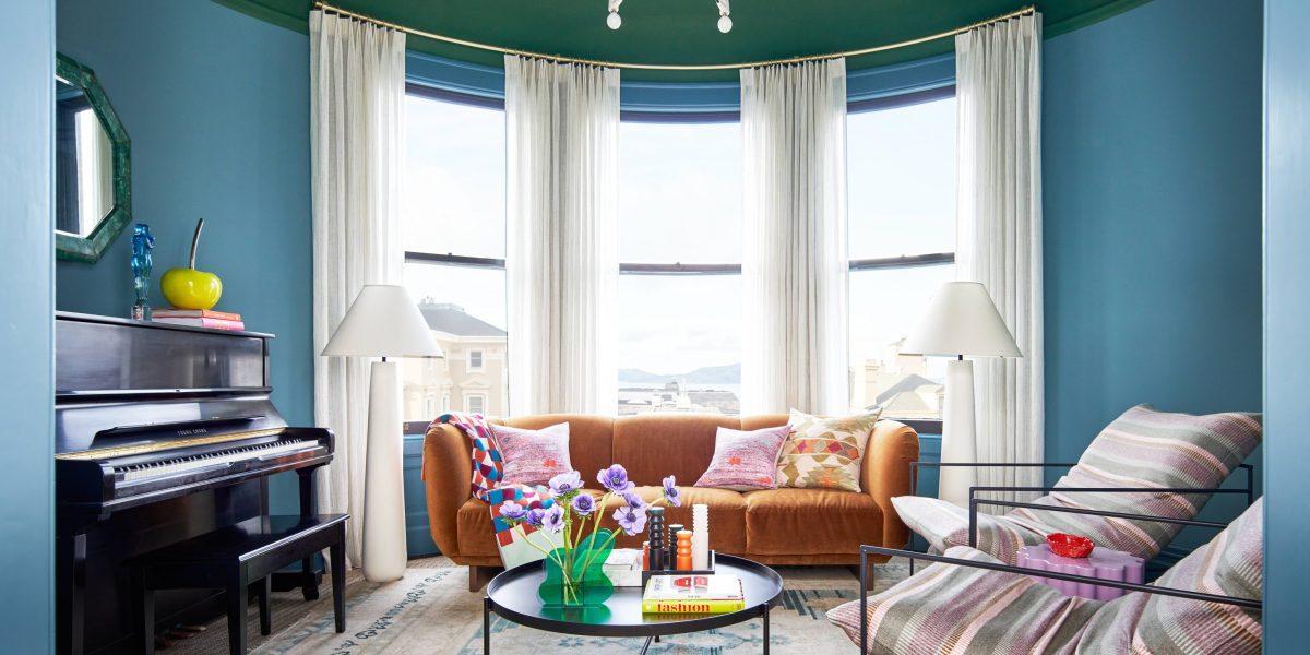 Green and blue living room by Studio Munroe