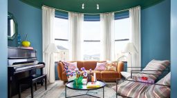 Green and blue living room by Studio Munroe