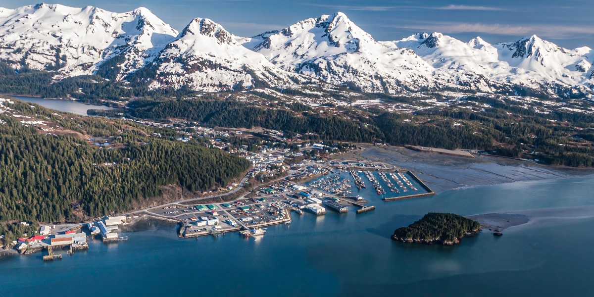 Cordova, Alaska from the air showing harbor and mountains.
