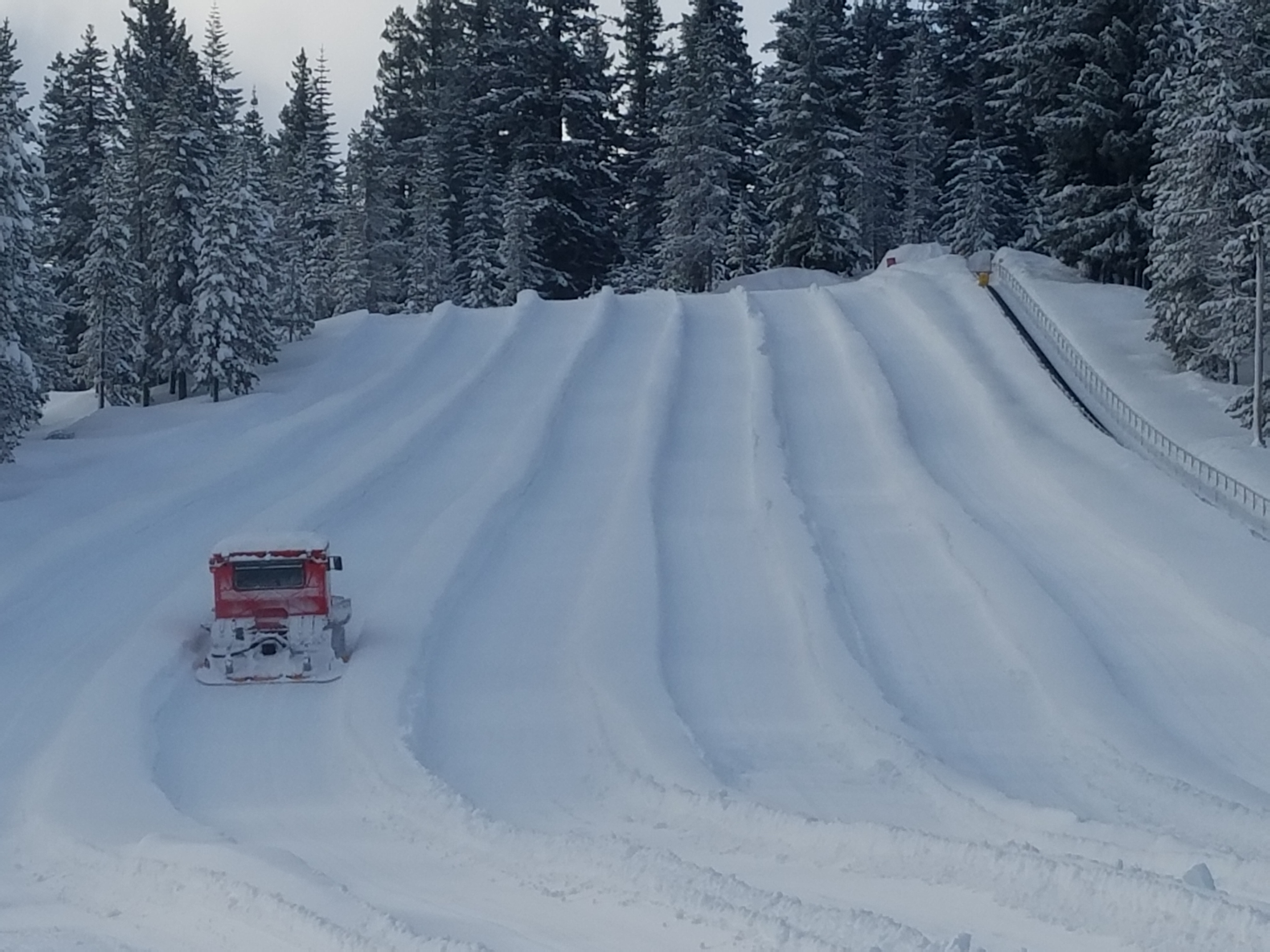 diamond-lakes-tubing-hill-being-prepared-and-groomed-for-the-day