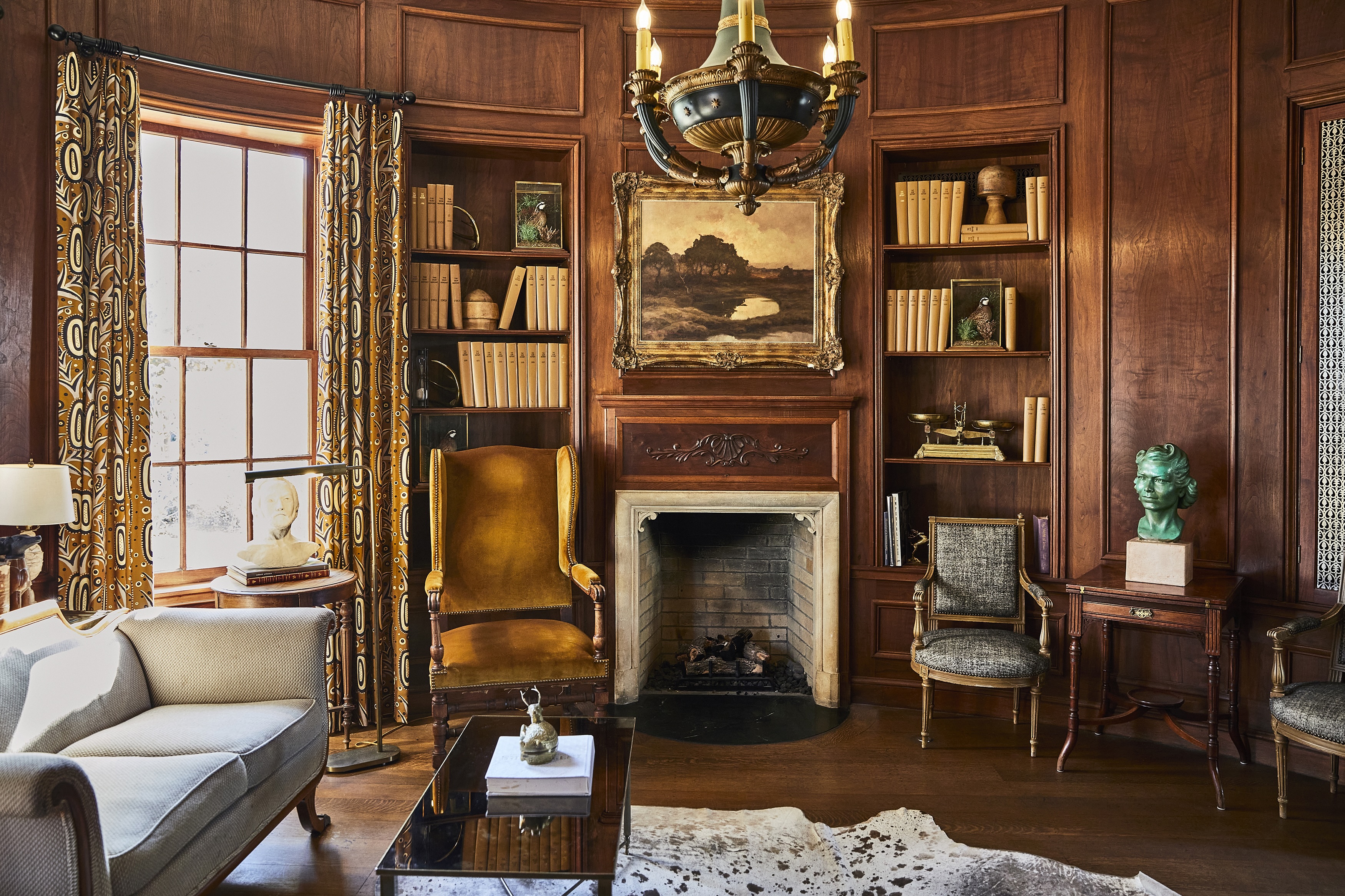 peruse-amenities-within-the-mansion-including-the-cozy-intimate-library-tucked-just-inside-the-main-lobby