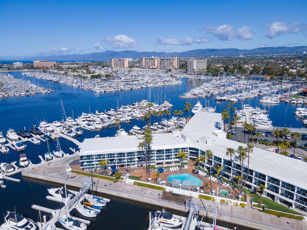 aerial-view-of-marina-del-rey-hotel-the-marinas-first-iconic-hotel-set-against-a-picturesque-waterfront-backdrop