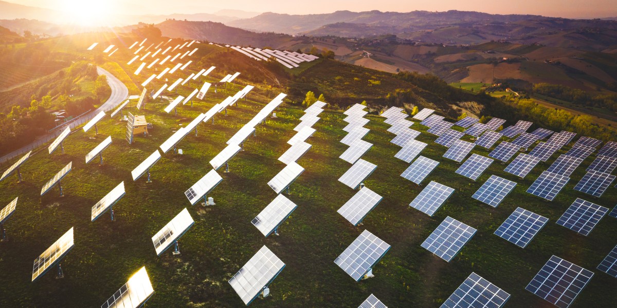 Solar panels fields on the green hills