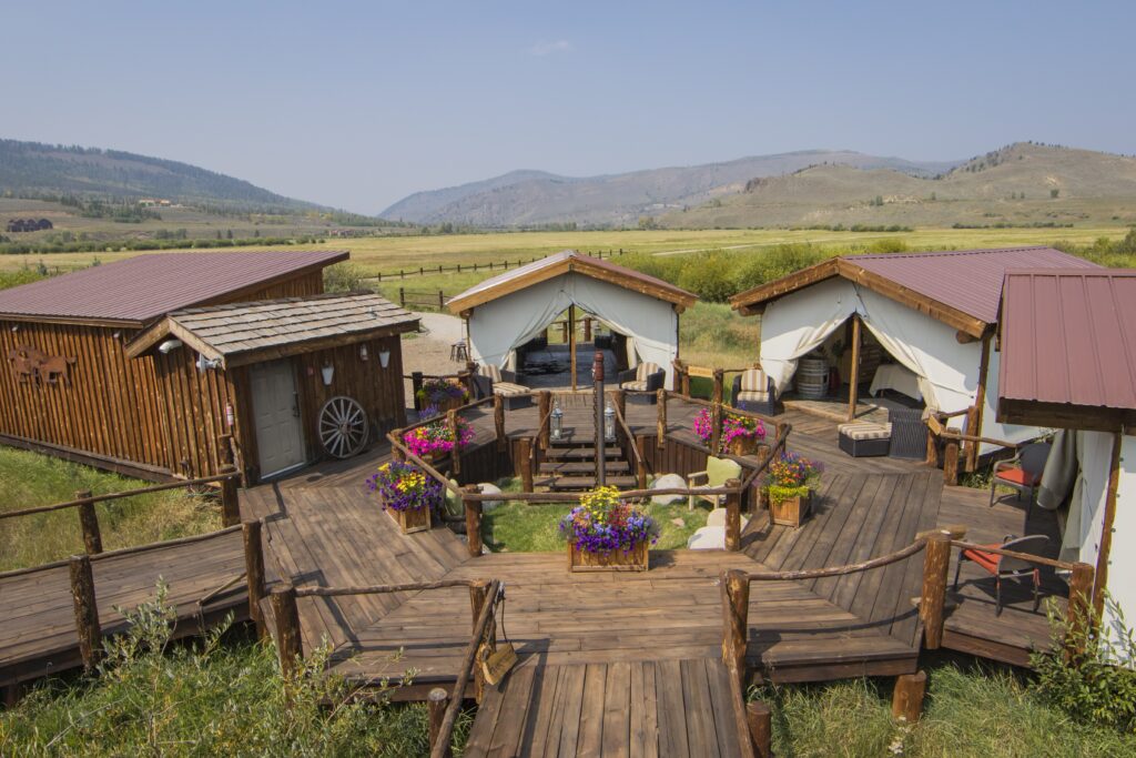 A Western ranch spa with several outdoor tents.