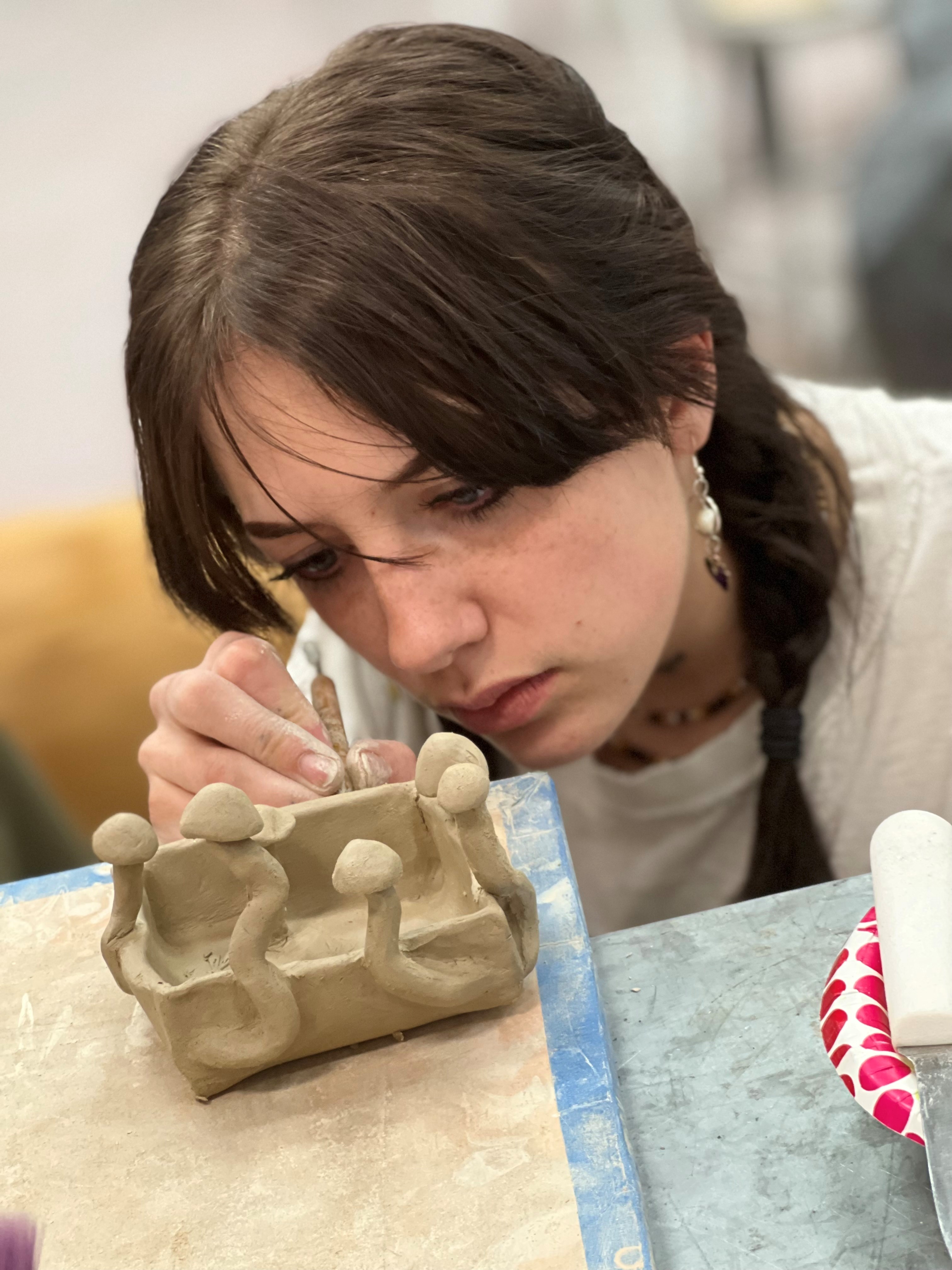 bella-hand-building-photo