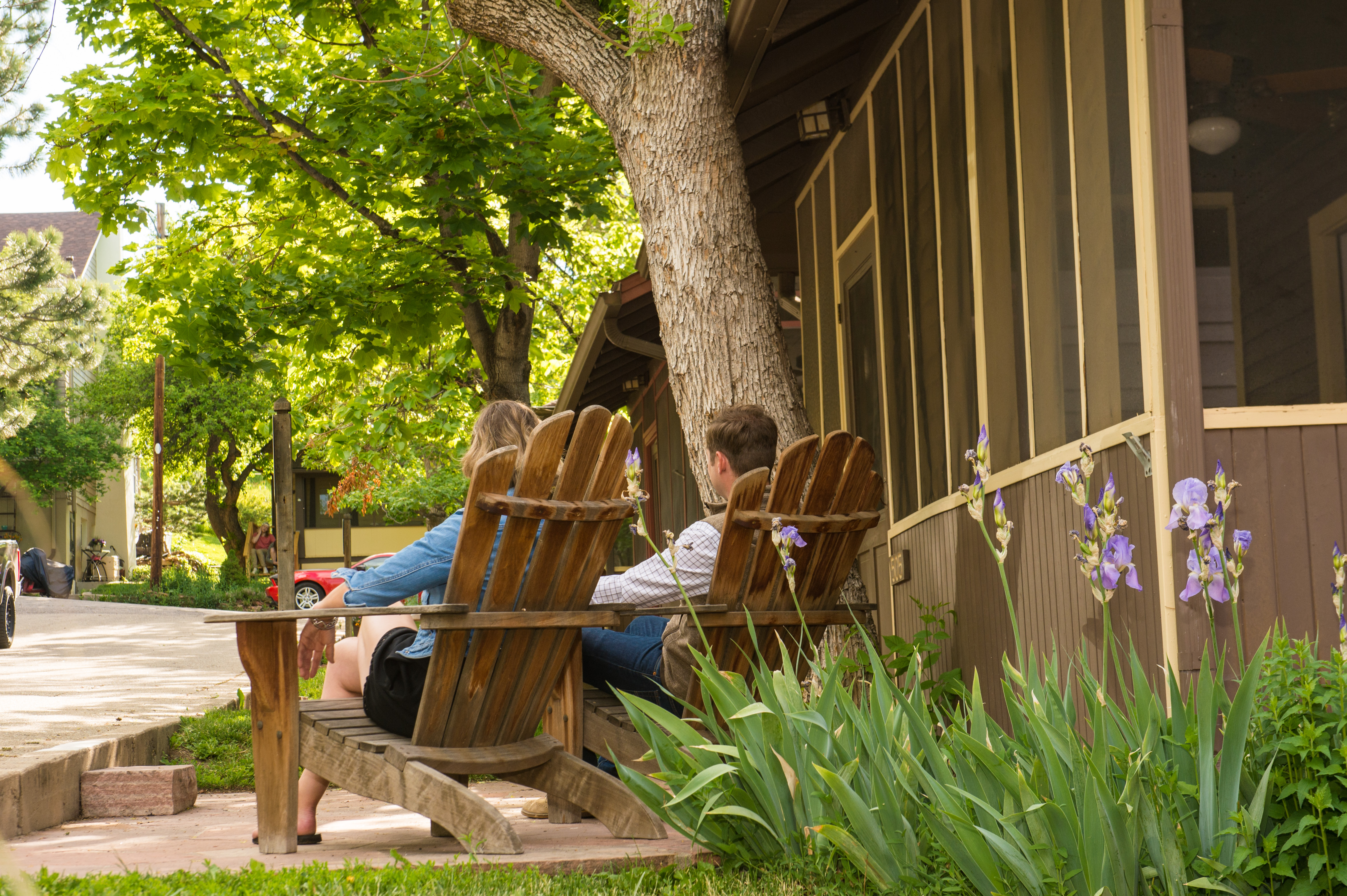 couple-sitting-outside-chautauqua-cottage