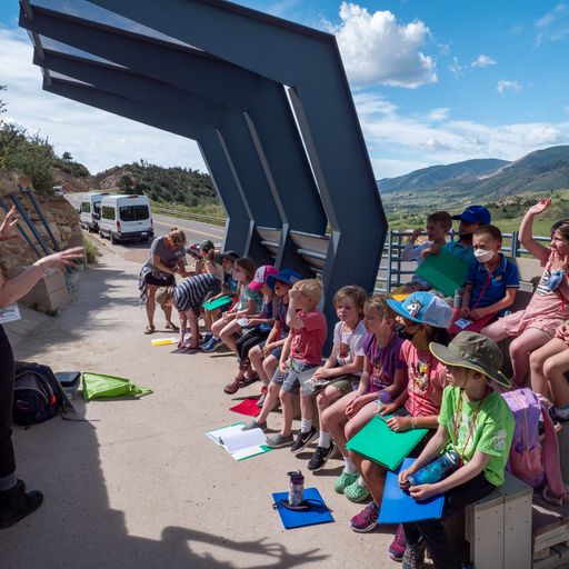 summer-campers-learn-about-the-geology-and-paleontology-at-dinosaur-ridge-with-outdoor-activities