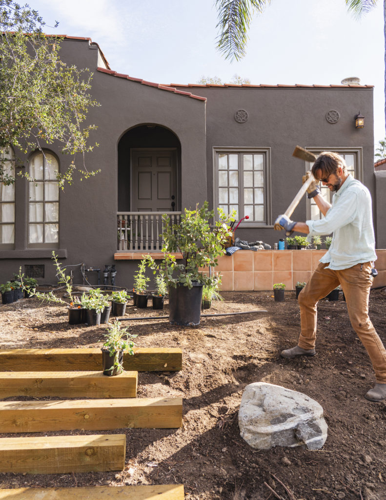 David Newsom of Wild Yards Project works on front yard garden