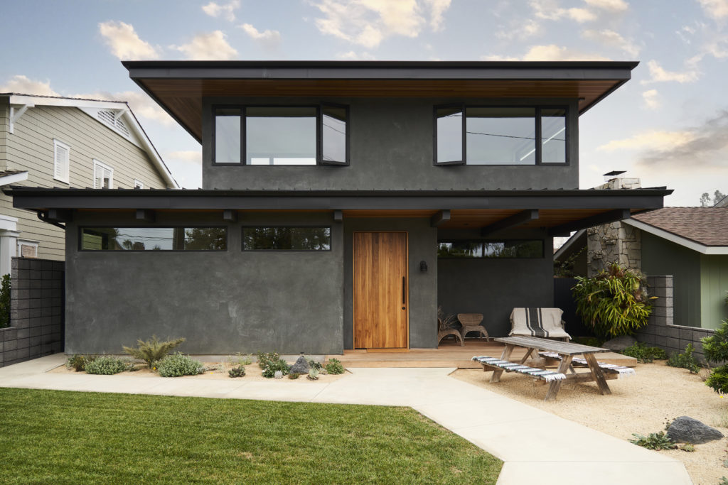 Newport Beach home exterior with picnic table