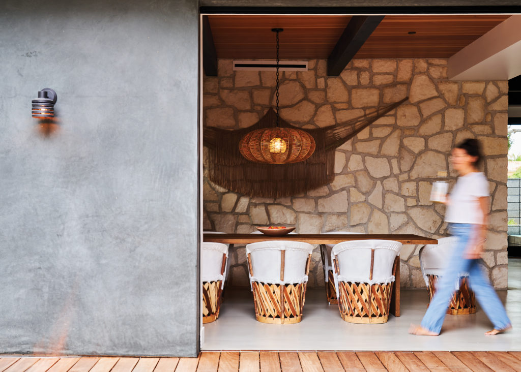 Newport Beach home dining room with chairs and pendant light