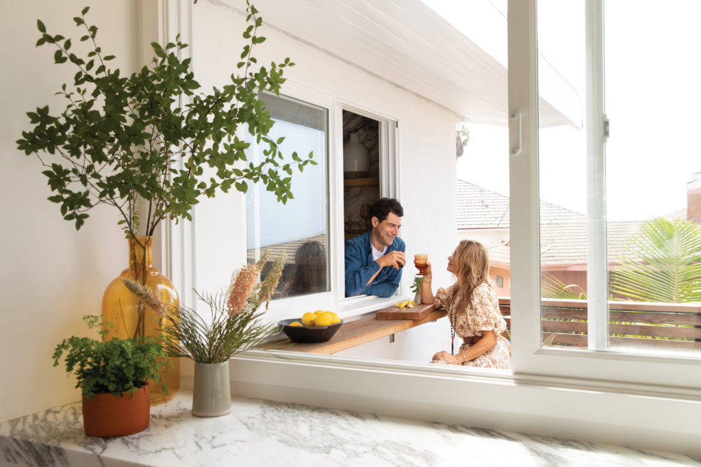 Tess Sanchez and Max Greenfield cheers at California home