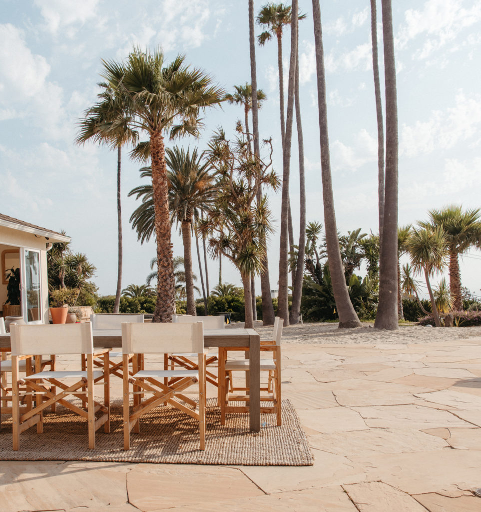 Malibu home backyard outdoor dining room