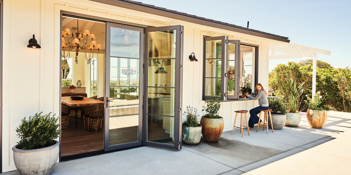 Indoor/outdoor living with bifold doors and passthrough window