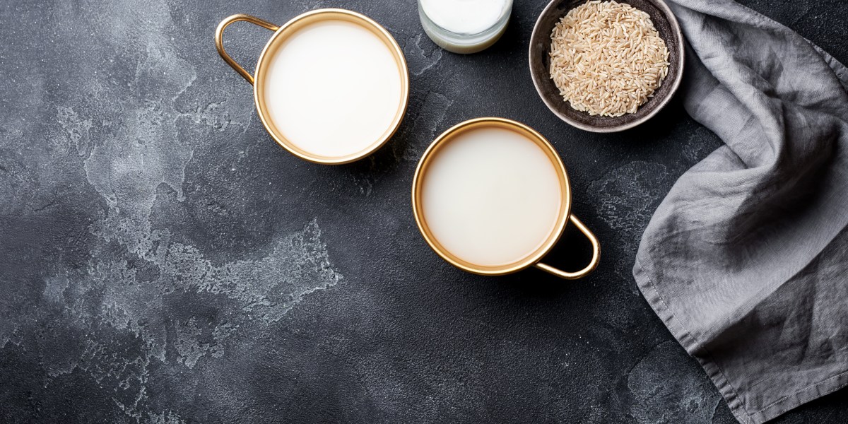Makgeolli in mugs with rice bowl