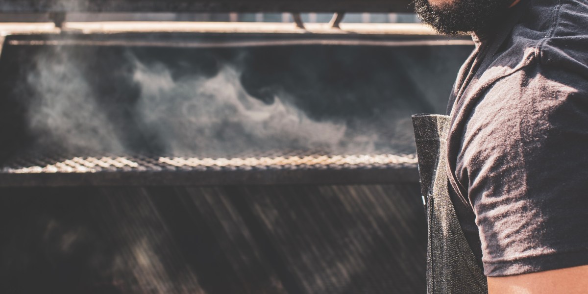 Matt Horn at the smoker looking at camera