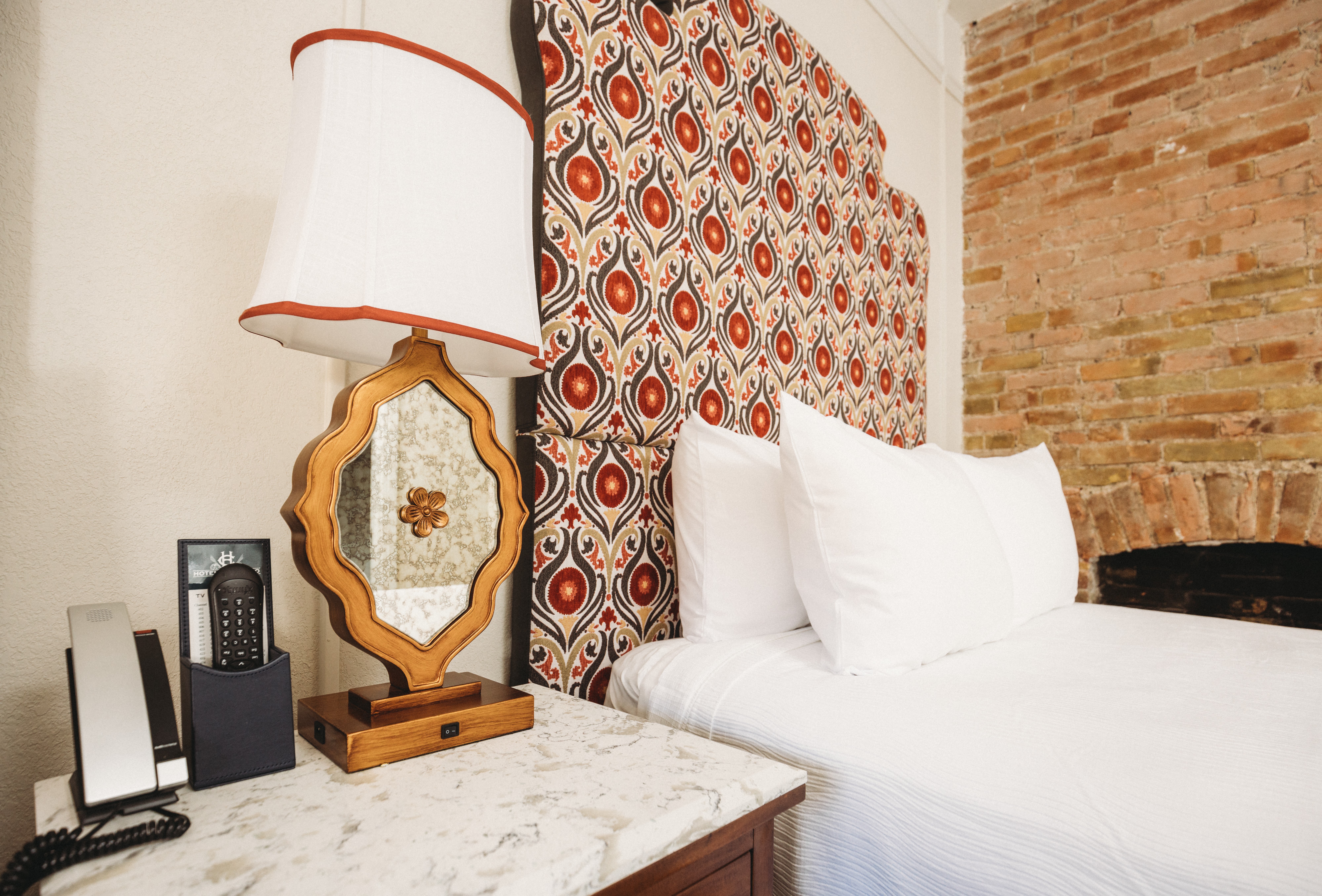renovated-hotel-colorado-guestroom-with-fireplace-accent