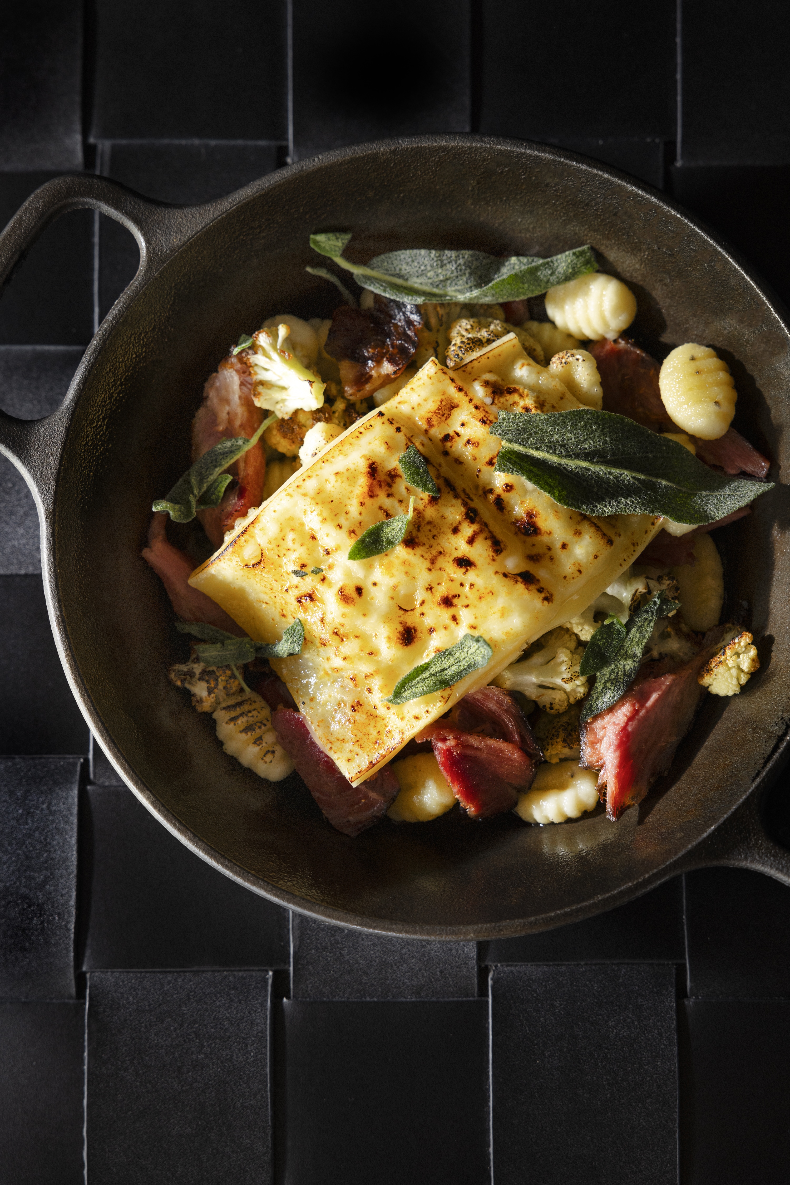 the-lookout-bar-menu-includes-raclette-dumplings-featuring-ham-hocks-cauliflower-and-sage-dumplings
