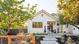 Family infront of house