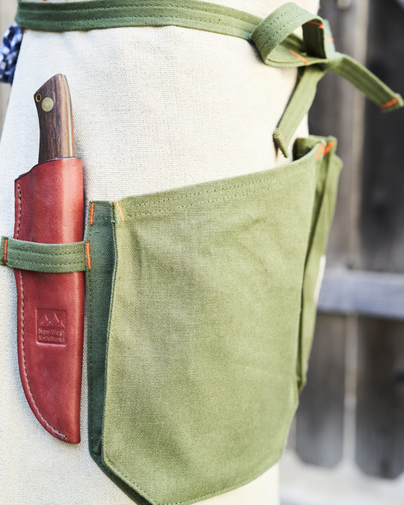Sunset Garden Apron side view on knife