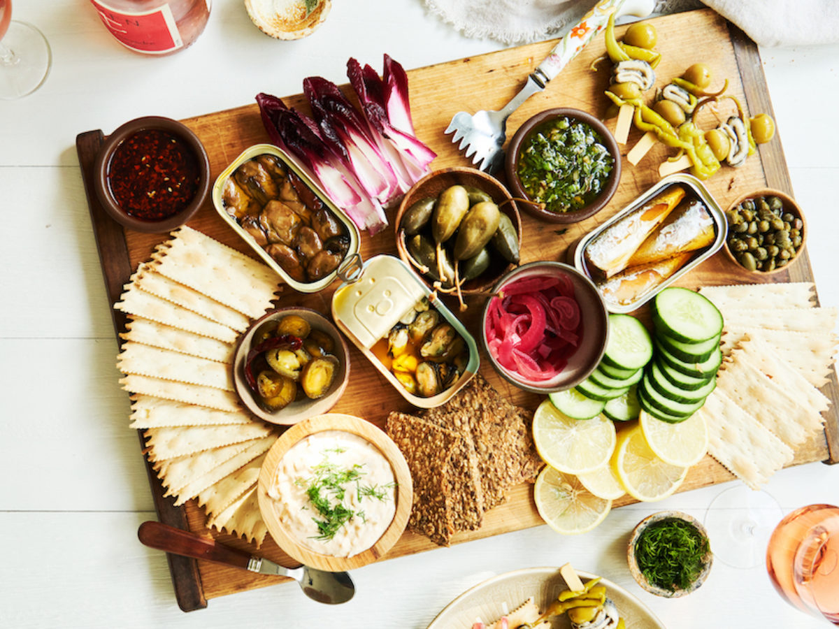 Tinned fish and accoutrements make for a seacuterie board for entertaining by Thomas J. Story