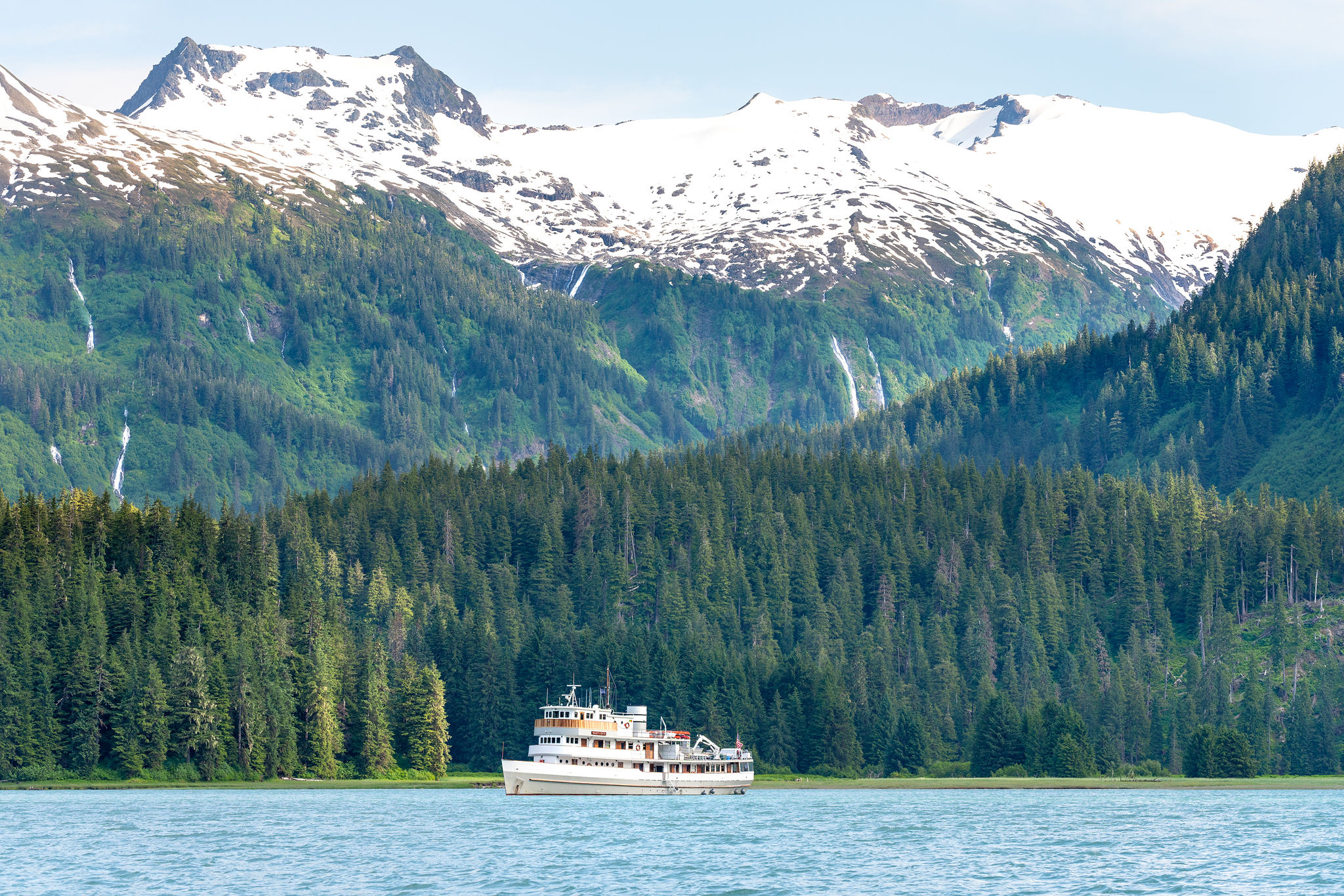 the-boat-companys-ship-amongst-the-beautiful-tongass-national-forests-trees-glaciers-and-waterfalls