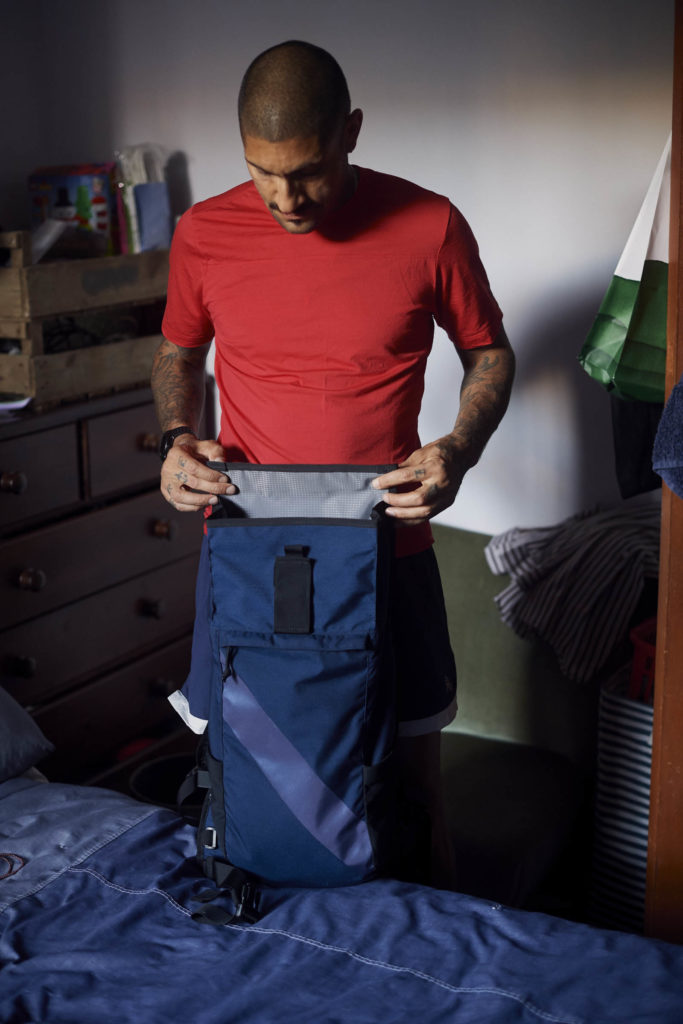 Leon Cerrone prepping his backpack before a run