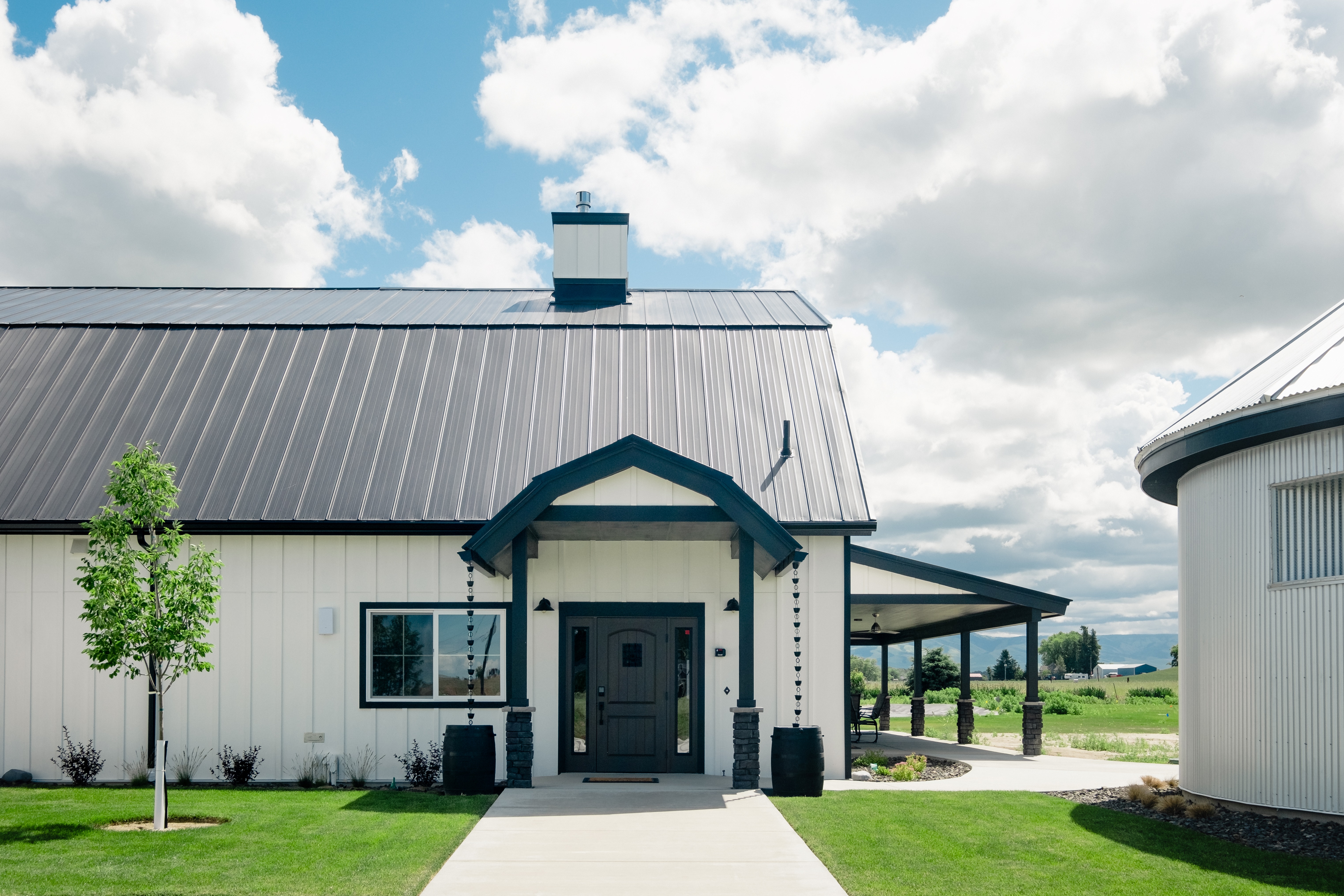 view-of-the-main-entrance-with-lounge-fireplace-dining-room