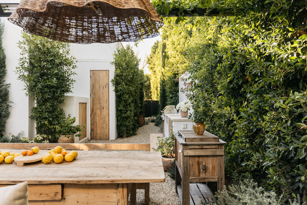 Antique Consoles in Melrose Backyard