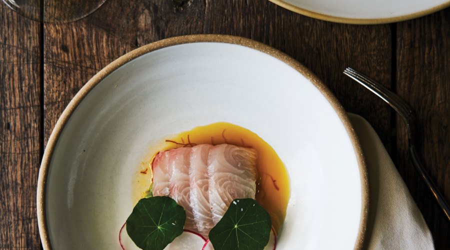 Dry-Aged Kampachi Crudo, Saffron Oil, Avocado, Radish & Nasturtium