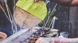 Saw Naing Fans the Grill