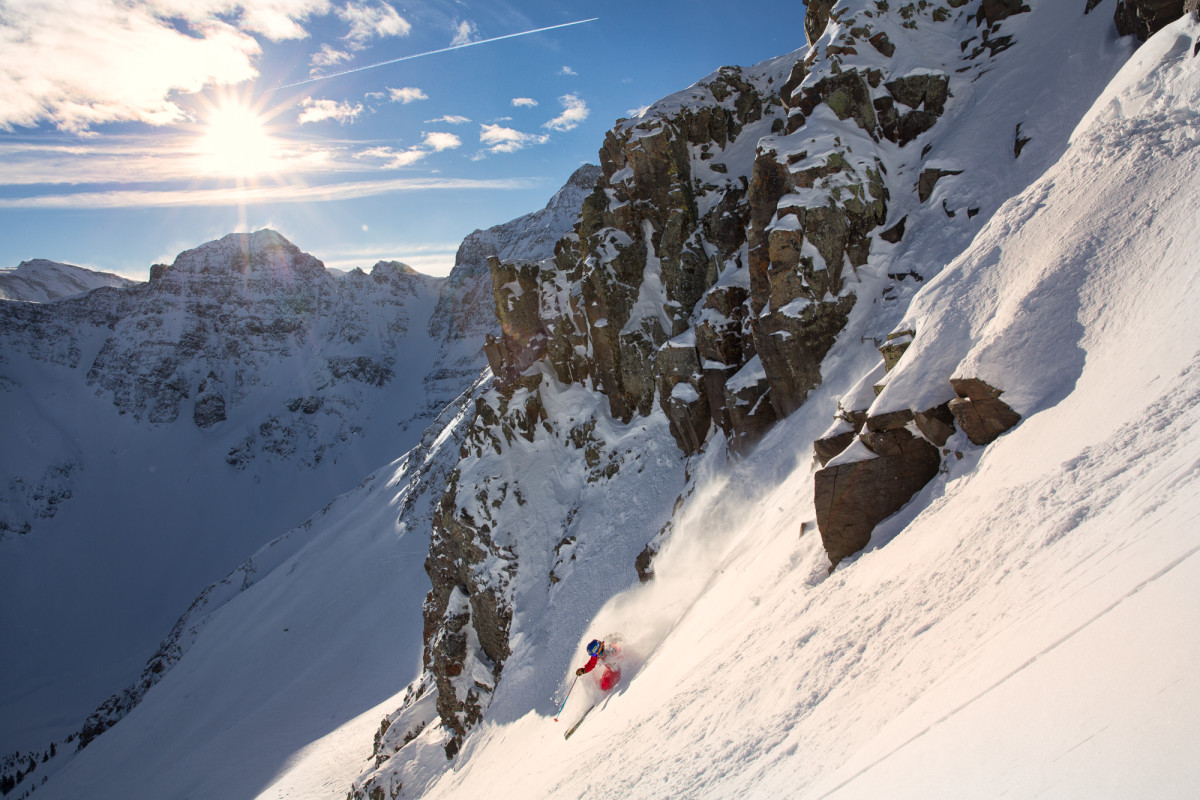 Skier riding down steep mountain at Silverton