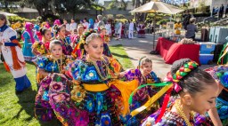 Little girls in costume lined up for performance at Day of the Dead event at the Oakland Museum of California