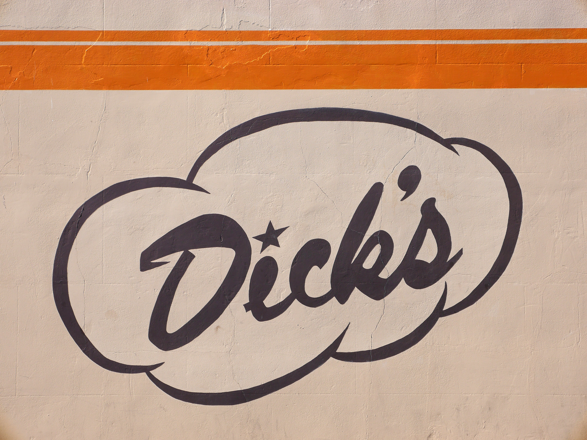 Dick's Drive-in logo on restaurant wall