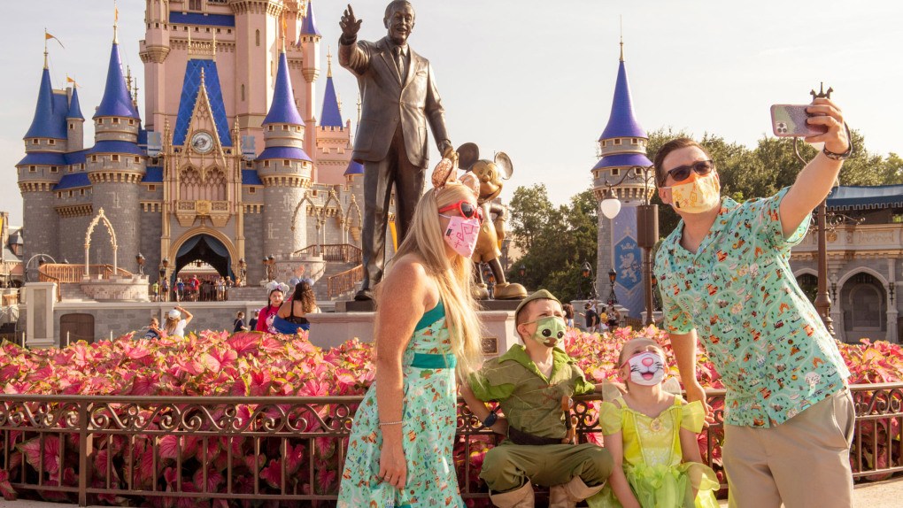 Family in Front of Disney Castle