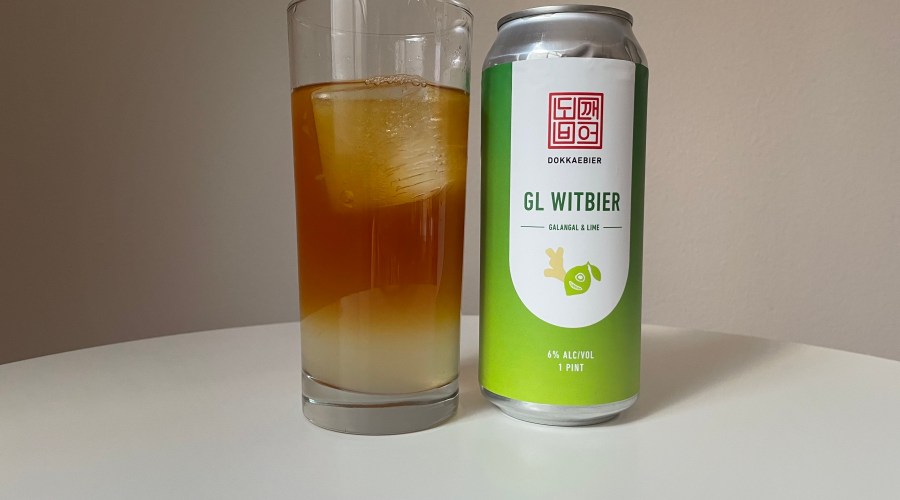 San Fransisco-inspired Moscow mule made with Dokkaebier's GL Witbier shown in a highball glass on a white table next to a can of GL Witbier.