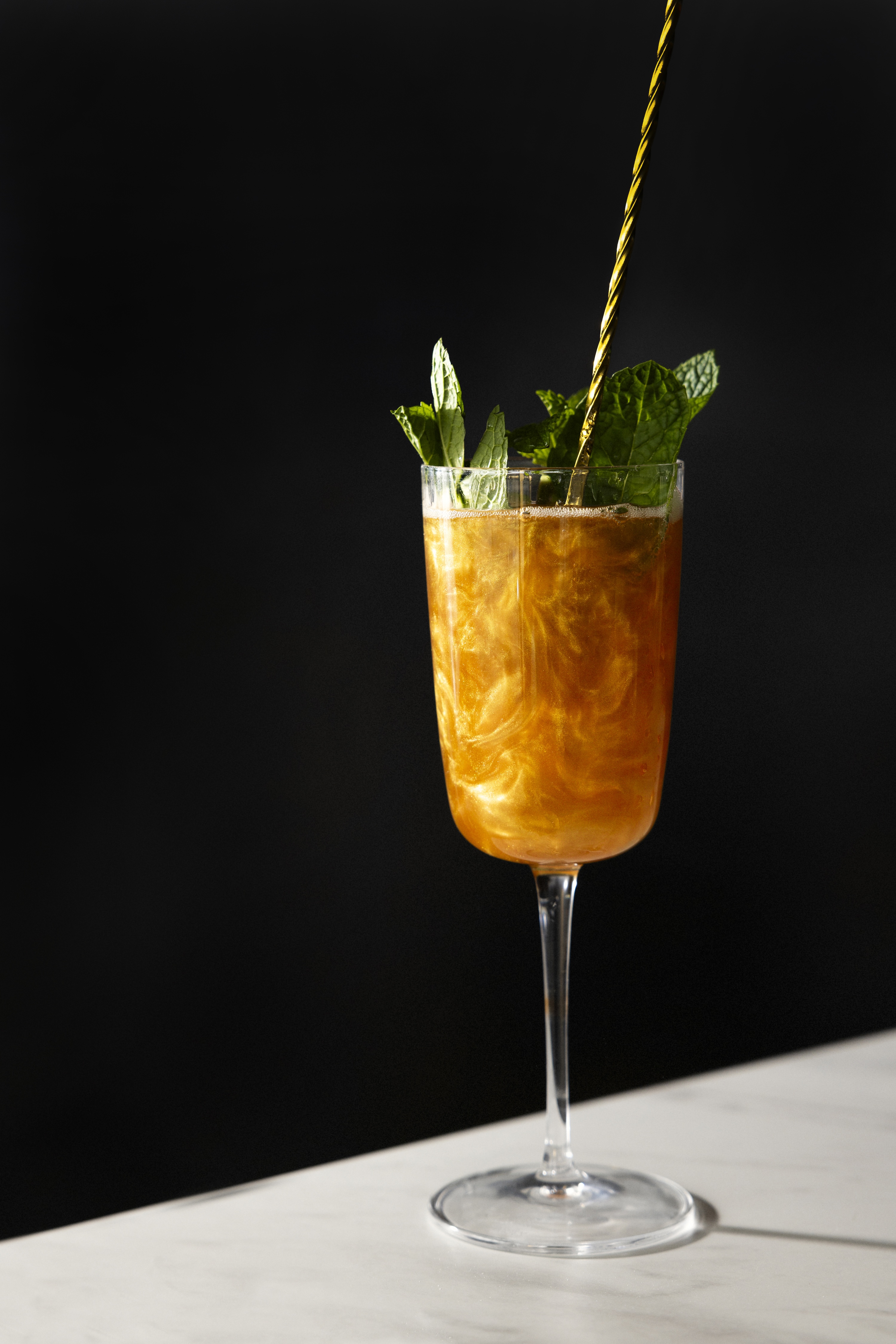 the-shooting-star-spritz-cocktail-is-made-with-insolito-reposado-aperol-lemon-bubbles-and-luster-dust