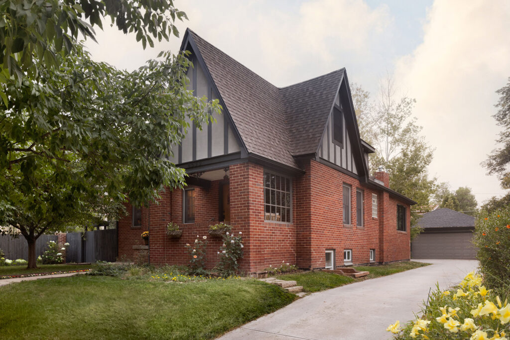 Exterior in Denver English Tudor by Atelier Design