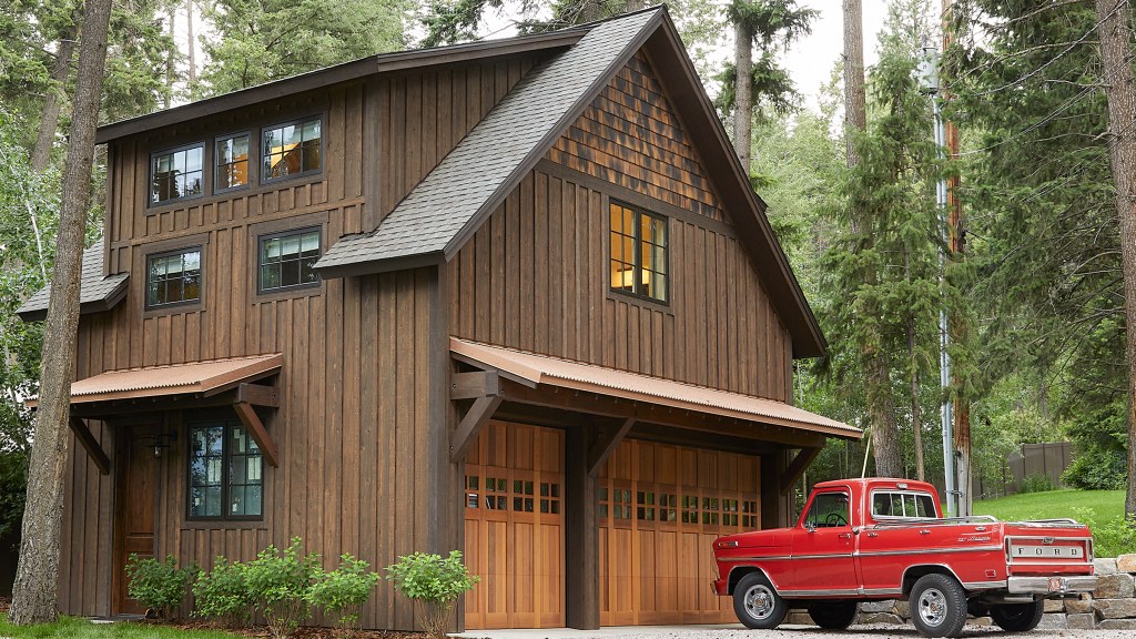 This 3-Car Garage and Boathouse Has a Stunning Surprise Upstairs