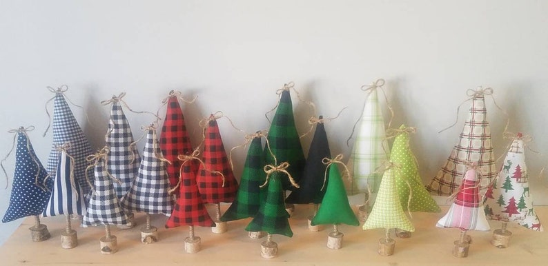 various colors patterns and sizes of fabric trees