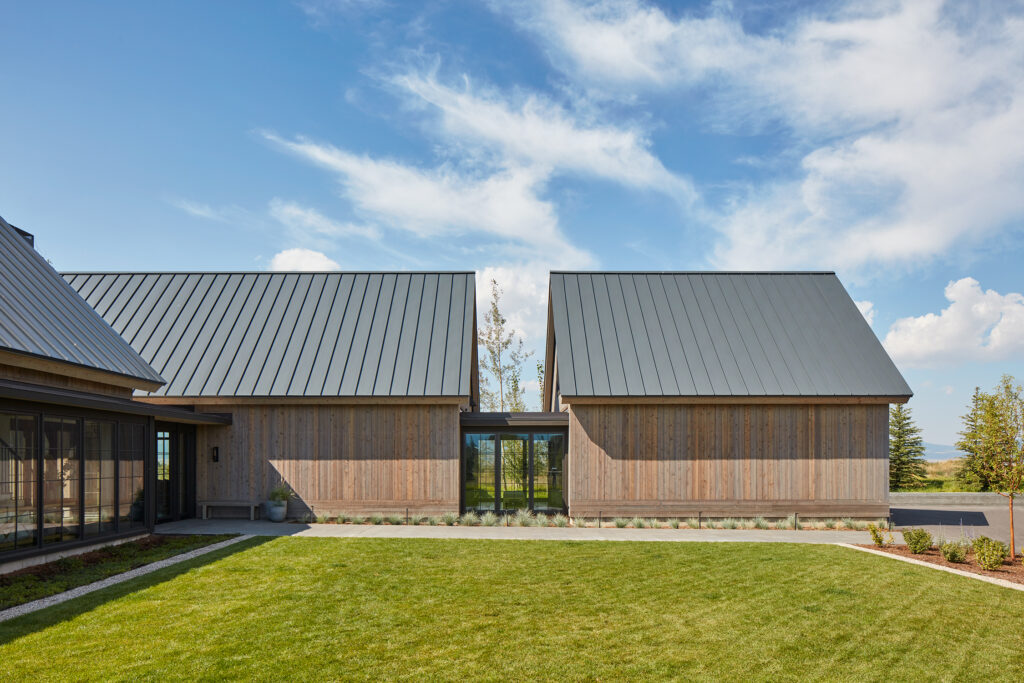 Glass Box Hallway in Driggs Idaho House by Robbins Architecture