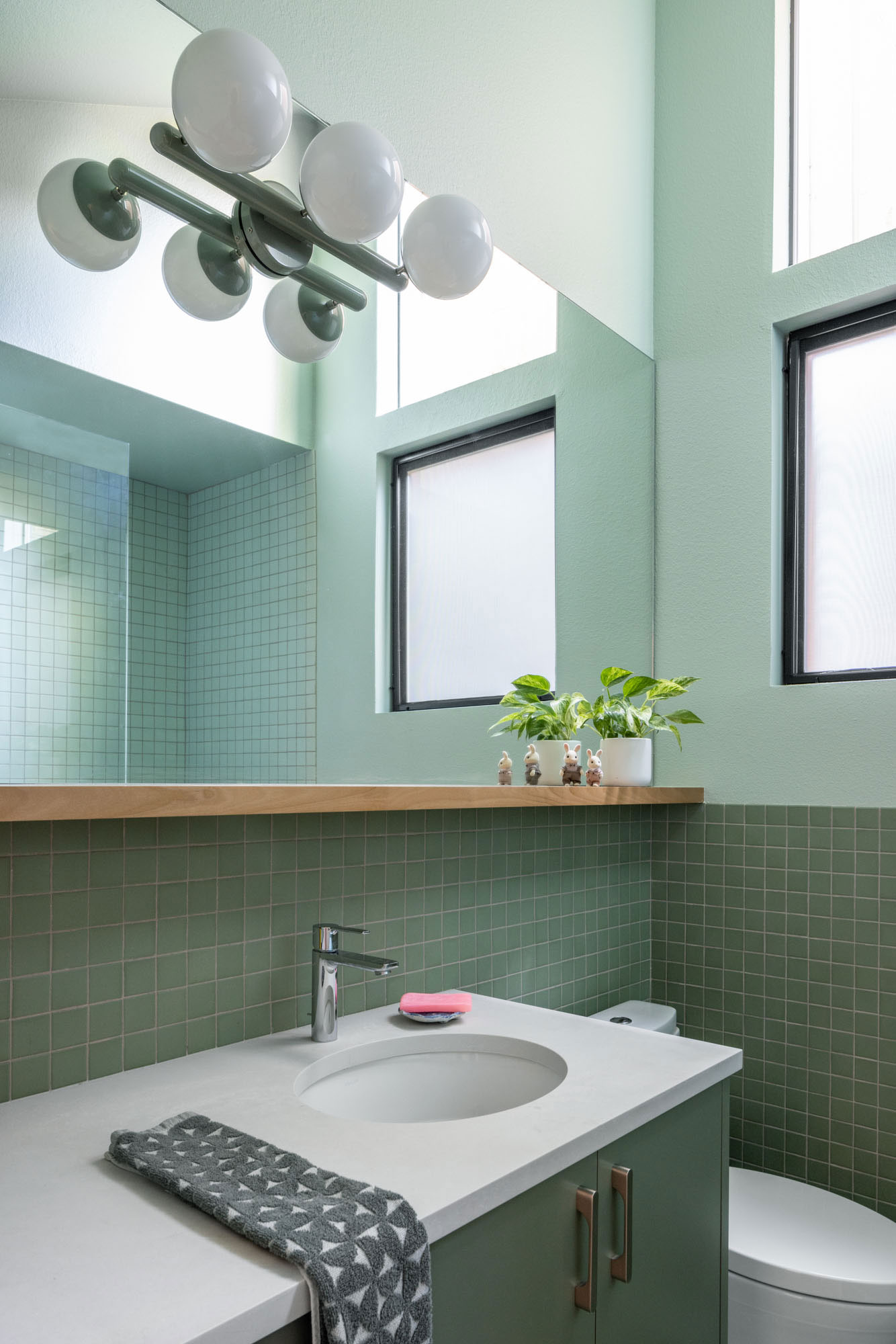 Green Bathroom in Wedgewood Seattle House by Best Practice Architecture