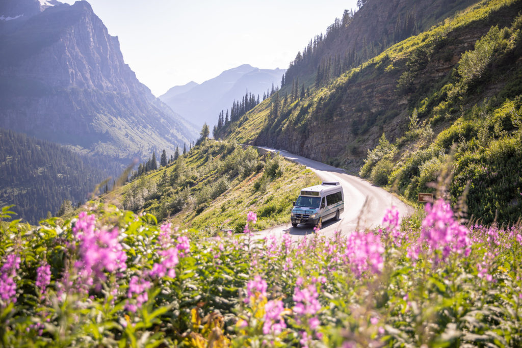 Van riding through the Going to the Sun road in Glacier National Park off Highway 89