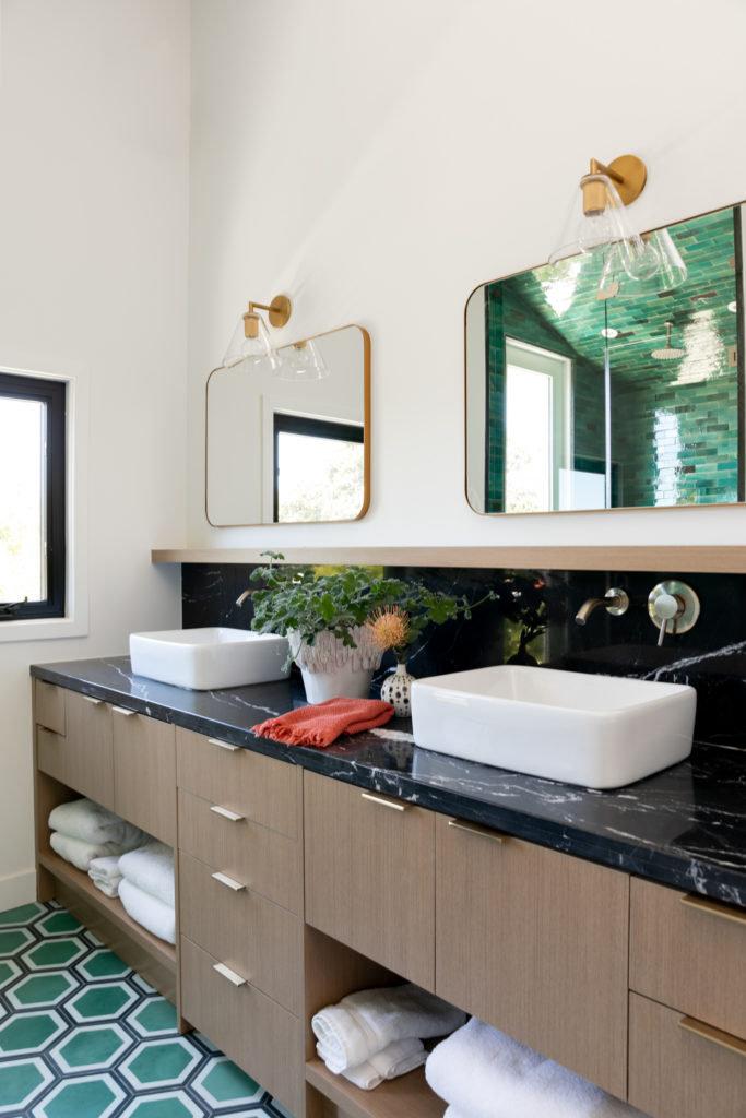 Cle tile black marble primary bathroom