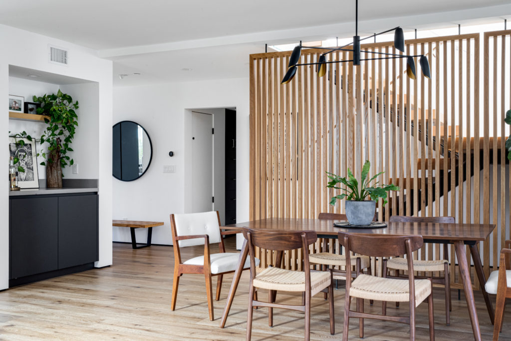 laguna-modern-dining-room-pale-wood-floor-black-chandelier