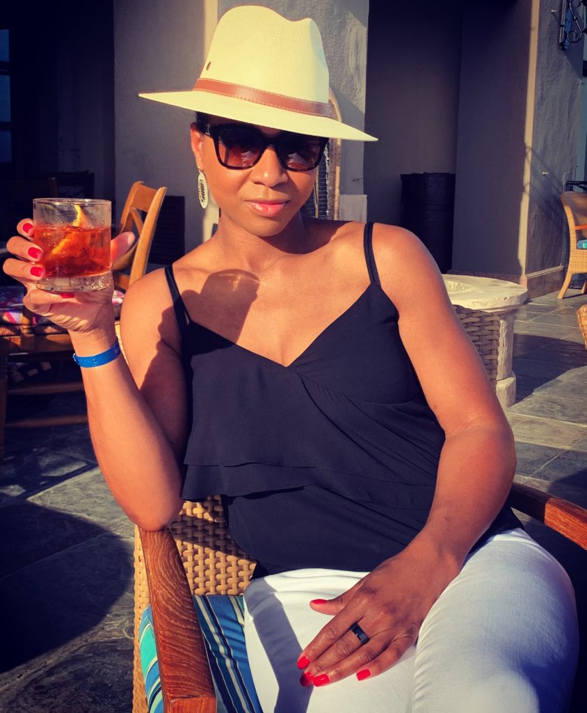 Karen Anderson in a Chair with a Cocktail